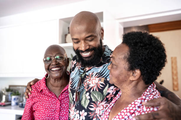 istock Happy family smiling and hugging 1182040445