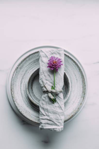istock grey bowls and plates on a white marble table . scandinavian ceramic vintage handmade dishes. Flat lay 1182043970