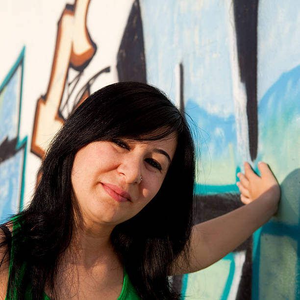 istock Young Woman Portrait Before Graffiti 118204414