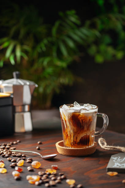 istock Iced coffee in glass with cream 1182048018