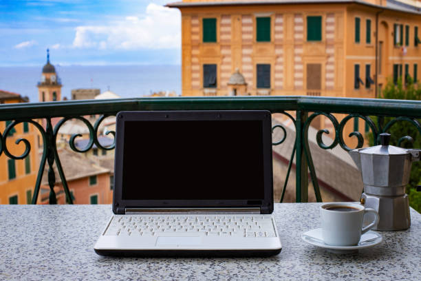 istock Hands typing on keyboard of a laptop with blank screen. 1182048663