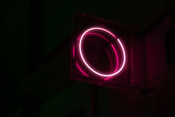istock round neon sign glowing at night. circle sign. 1182054729