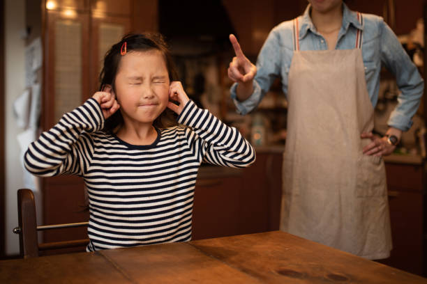 istock Cute girl angry by mom 1182054910