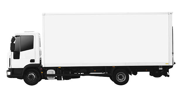 istock Side view of a white truck with large blank, white  trailer on white background.  118205708