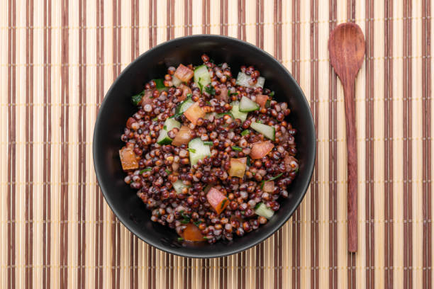 istock Cooked Sorghum (also known as sorgo) salad or couscous in a back bowl, isolated 1182061262