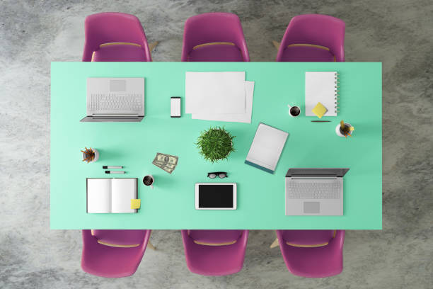 istock Top view at large team office desk 1182063759
