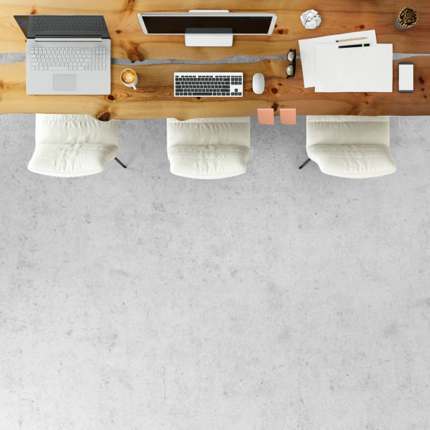 istock Top view at large team office desk 1182063766