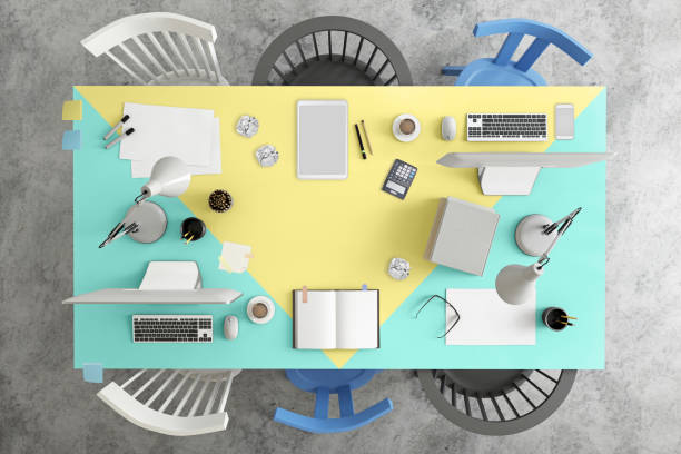 istock Top view at large team office desk 1182063799