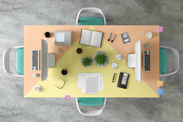 istock Top view at large team office desk 1182063810