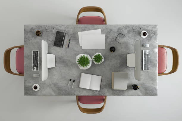 istock Top view at large team office desk 1182063816