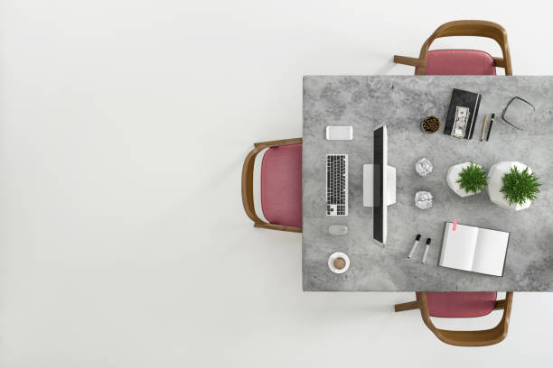 istock Top view at large team office desk 1182063817