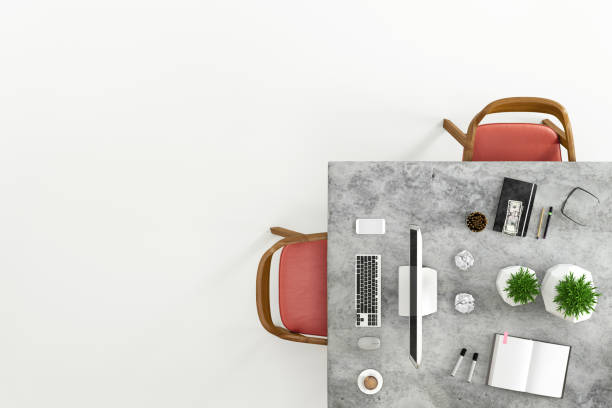 istock Top view at large team office desk 1182063818
