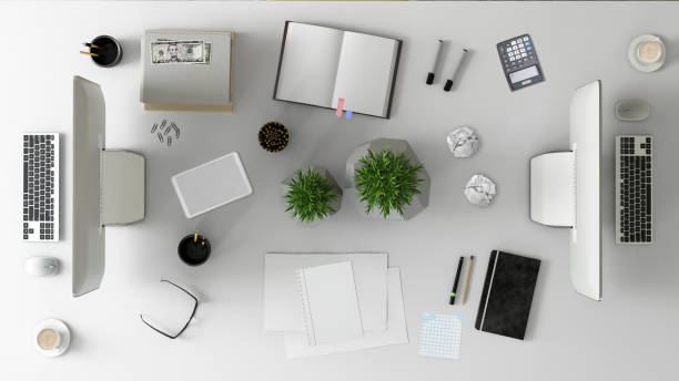 istock Top view at large team office desk 1182063822