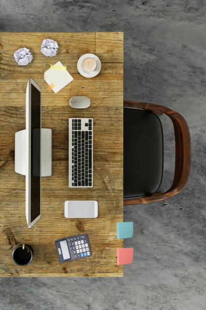 istock Top view at large team office desk 1182063827