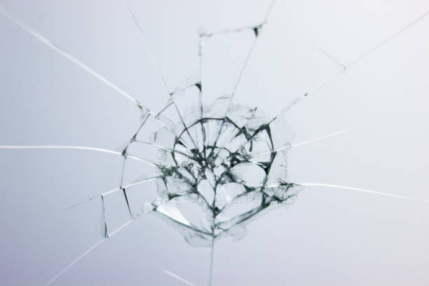 istock Broken glass background. Cracked glass. Shot in the window. 1182068607