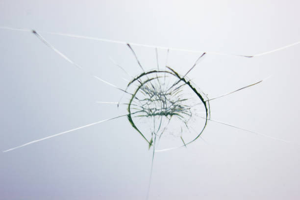 istock Broken glass background. Cracked glass. Shot in the window. 1182068621