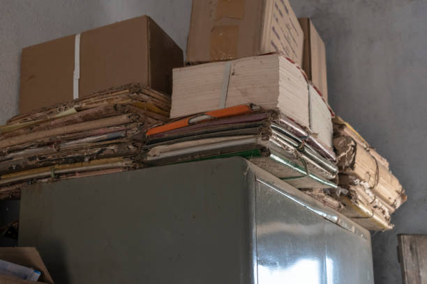 Old dusty stack of papers, files, documents on the shelves of the archive room