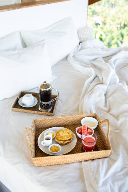 istock Breakfast in bed with coffee and  pancakes. 1182073055