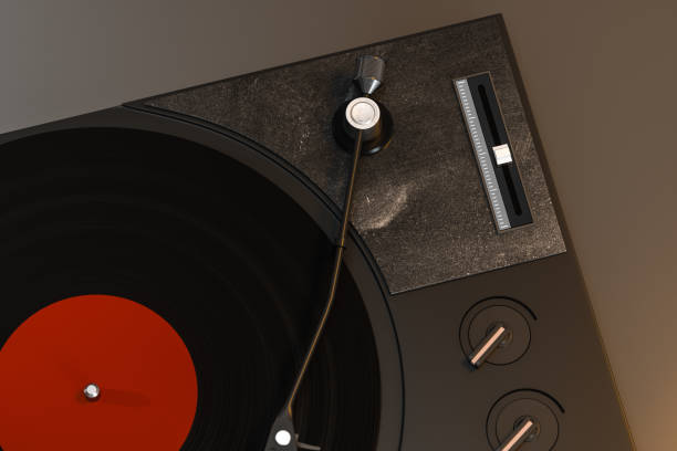 istock The dark vinyl record player on the table, 3d rendering. 1182073549