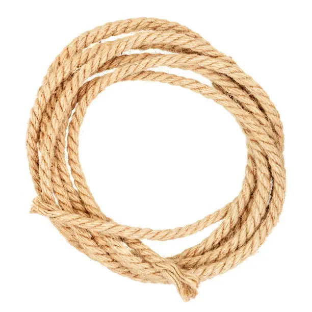 Coil of jute rope isolated on a white background