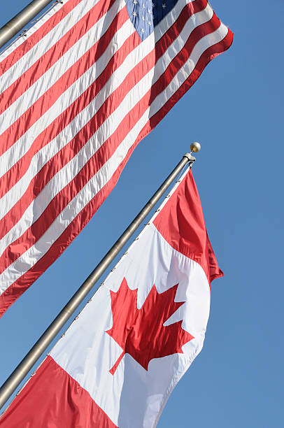 istock Canadian and American Flags 118207502