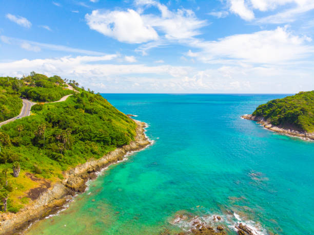 istock Sea island with turquoise water against blue sky 1182079921