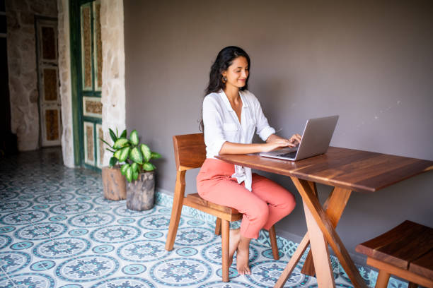 istock Young woman using a laptop 1182081585