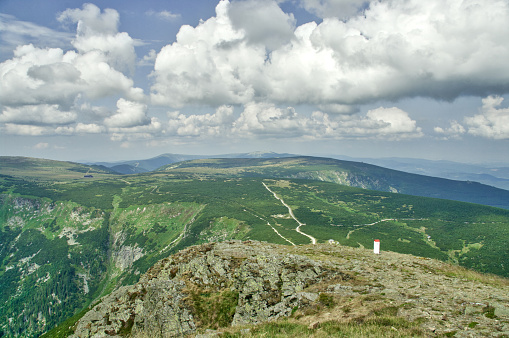 View from Sněžka or Śnieżka  a mountain on the border between the Czech Republic and Poland, the most prominent point of the Silesian Ridge in the Krkonoše mountains. At, its summit is the highest point in the Czech Republic