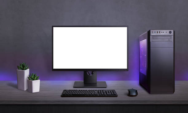 istock Gaming PC with isolated screen for mockup, app or game presentation. Modern case with RGB light, keyboard and mouse on desk. 1182084907