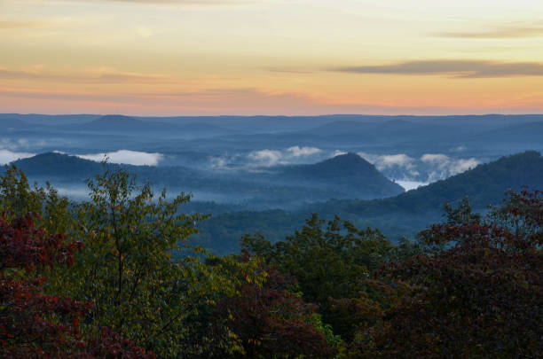 istock View over the valley on an early fall morning. 1182085736