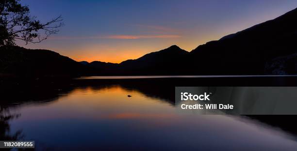 The Sun Has Set Behind The Mountains Around Llyn Gwynant In Snowdonia Stock Photo - Download Image Now
