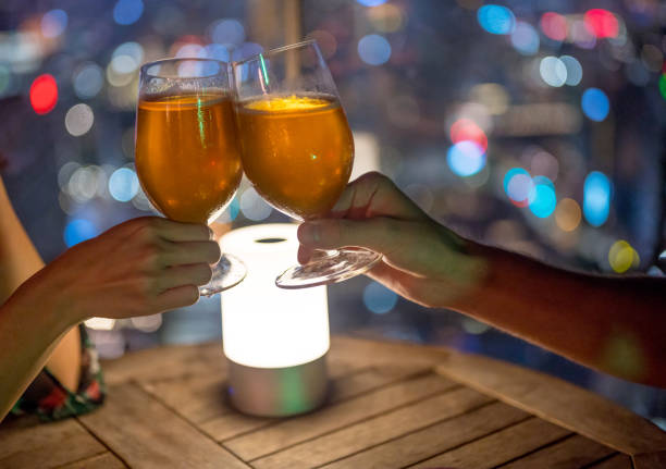 istock Couple toasting with beer 1182090577