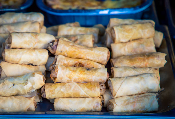 istock fresh sausage rolls at a market 1182093986
