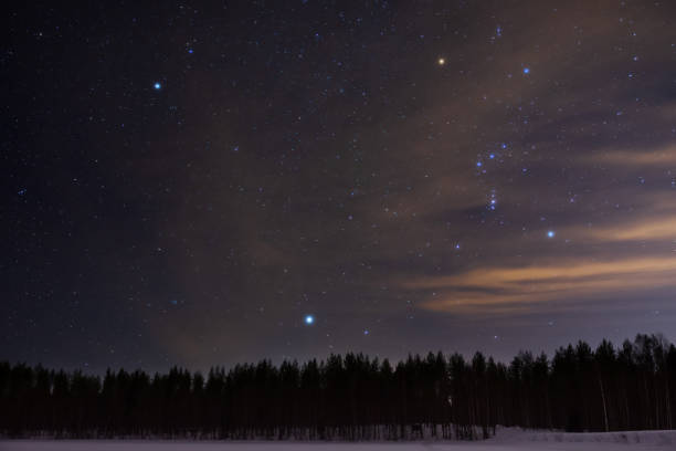 istock Orion and Canis Minor constellations and Sirius above boreal forest 1182095141