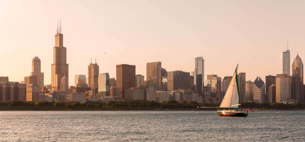istock A sailing boat returns to harbour in Chicago at sunset 1182098488