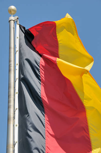 deutsche flagge - tag der deutschen einheit stock-fotos und bilder