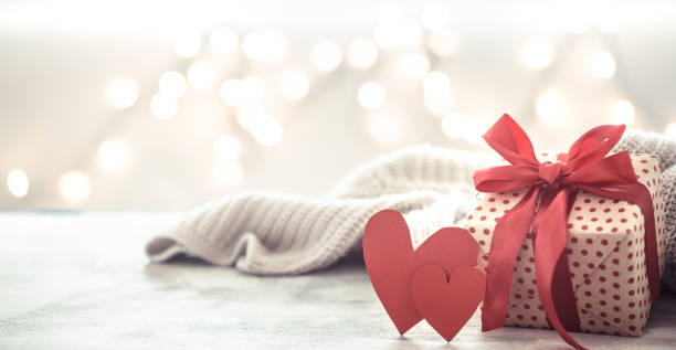 istock Background holiday, gift in a beautiful box with a heart . 1182115735