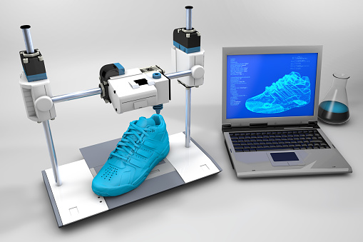 3D printer machine is printing performance shoe in home.