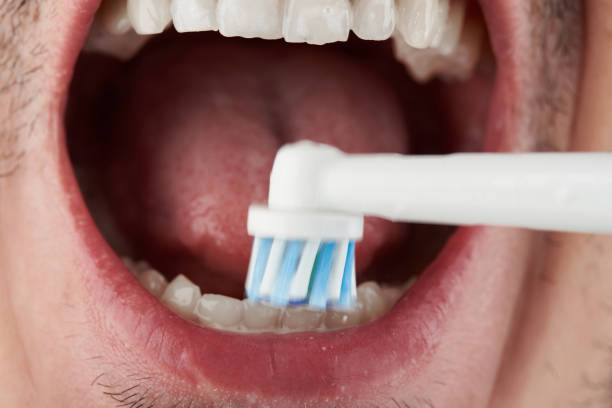 istock Close up of cleaning teeth 1182123360