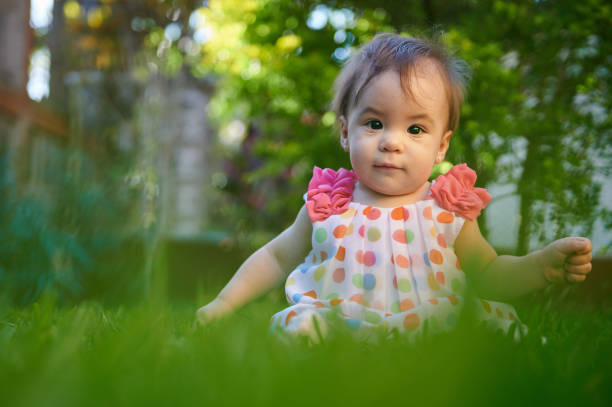 istock Pretty baby on summer field 1182123661