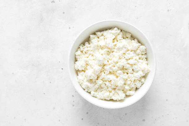 istock Cheese cottage in bowl, top view 1182128442