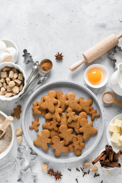 istock Christmas or X-mas baking culinary background, cooking recipe. Xmas gingerbread on kitchen table and ingredients for cooking festive cookies. New Year holiday decorations, copy space 1182128726