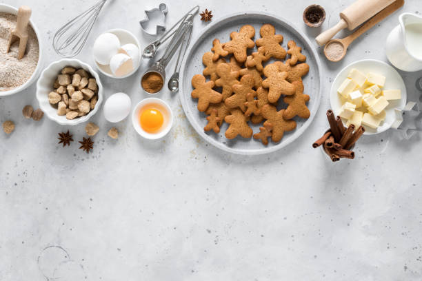 istock Christmas or X-mas baking culinary background, cooking recipe. Xmas gingerbread on kitchen table and ingredients for cooking festive cookies. New Year holiday decorations, copy space 1182128763