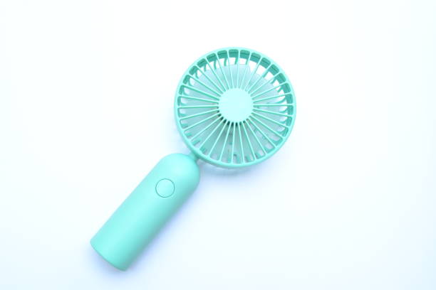 Portable rechargeable mini fans Portable fans that can be easily carried everywhere. Close-up of tosca portable fans. Easy rechargeable with usb cable. Compact mini fans. hand fan photos stock pictures, royalty-free photos & images