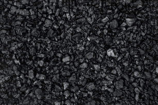 istock Dark coal texture, coal mining, fossil fuels, environmental pollution. 1182138123