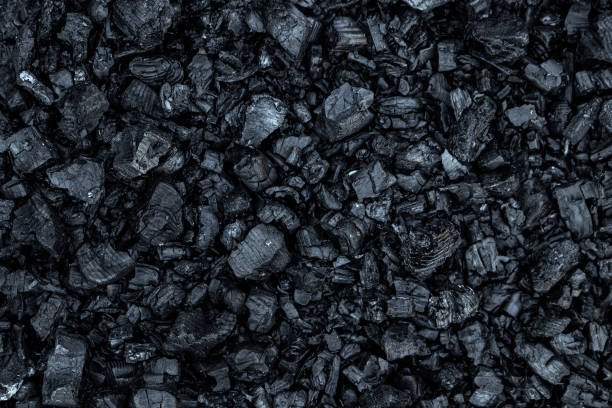 istock Dark coal texture, coal mining, fossil fuels, environmental pollution. 1182138126