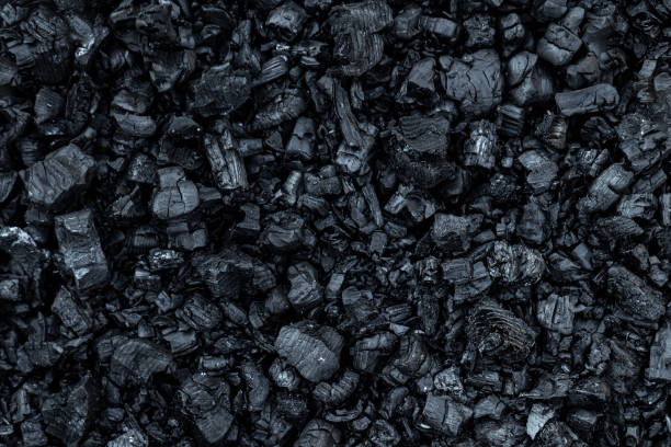 istock Dark coal texture, coal mining, fossil fuels, environmental pollution. 1182138131