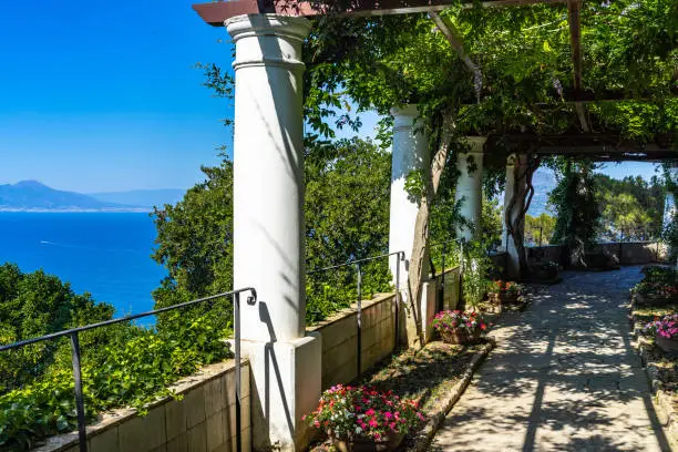 The gardens of Villa San Michele in Capri have a scenic panoramic view of Gulf of Naples and Sorrentine Peninsula, Italy