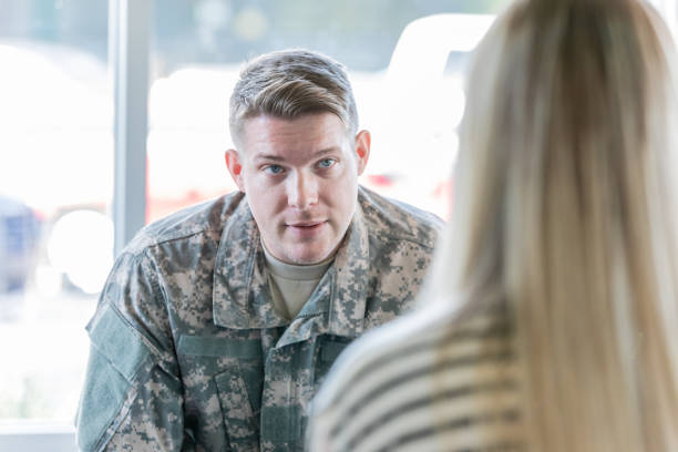 istock Veteran speaking with counselor 1182151568