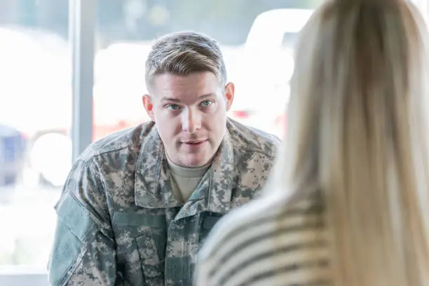 Photo of Veteran speaking with counselor